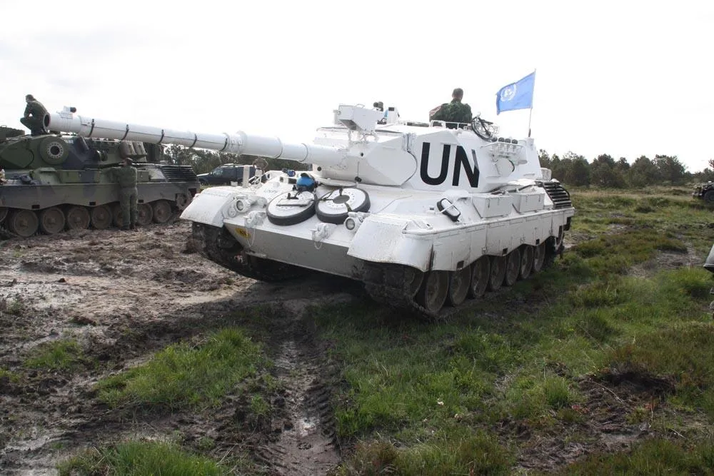 Et billede, der indeholder tank, sky, udendørs, KampvognAutomatisk genereret beskrivelse